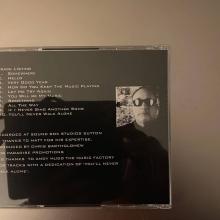 on 7= DO. You’Lt NEVER WALK ALONE =CORDED AT SOUND BOX STUDIOS SUTTON THANKS TO MATT FOR HIS EXPERTISE. DUCED BY CHRIS BARTHOLOMEW PARADISE PROMOTIONS HANKS TO ANDY MUDD THE MUSIC FACTORY TRACKS WITH A DEDICATION OF ‘YOU'LL NEVER ALONE’.